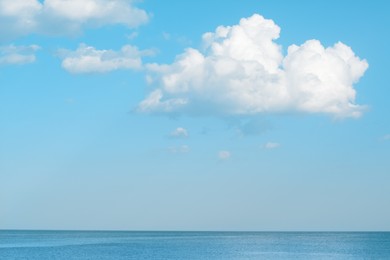 Beautiful view of sea under blue sky on cloudy day