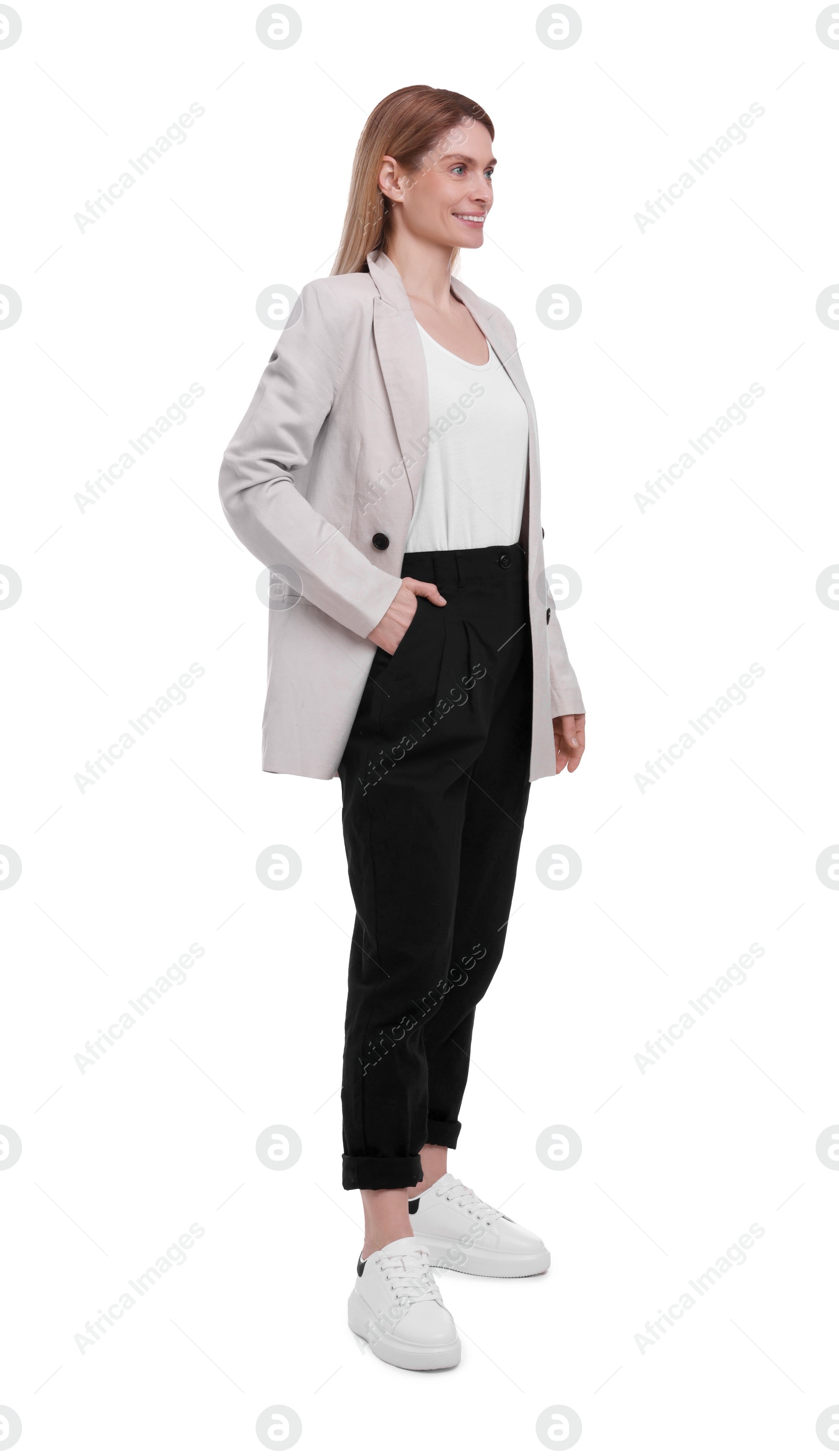 Photo of Beautiful happy businesswoman posing on white background