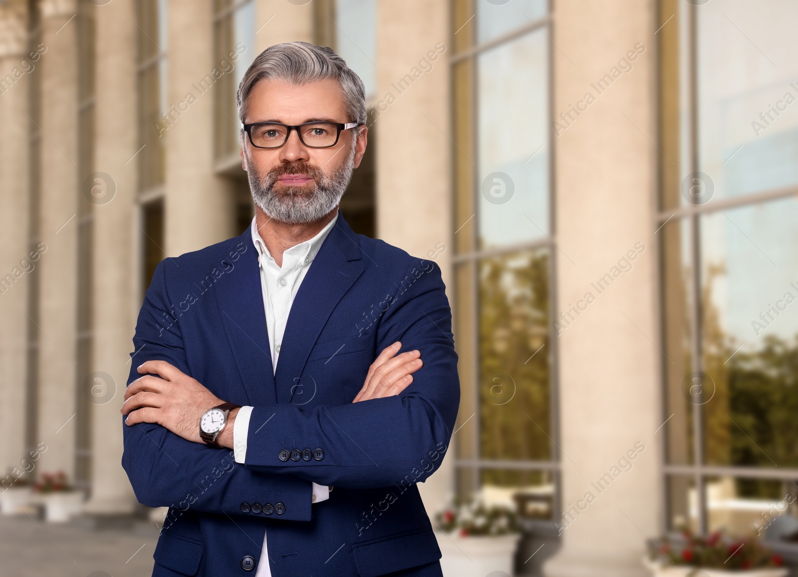 Image of Successful lawyer near building outdoors, space for text