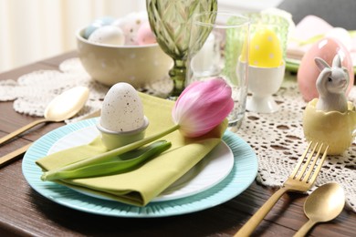 Photo of Festive table setting with beautiful tulip, closeup. Easter celebration