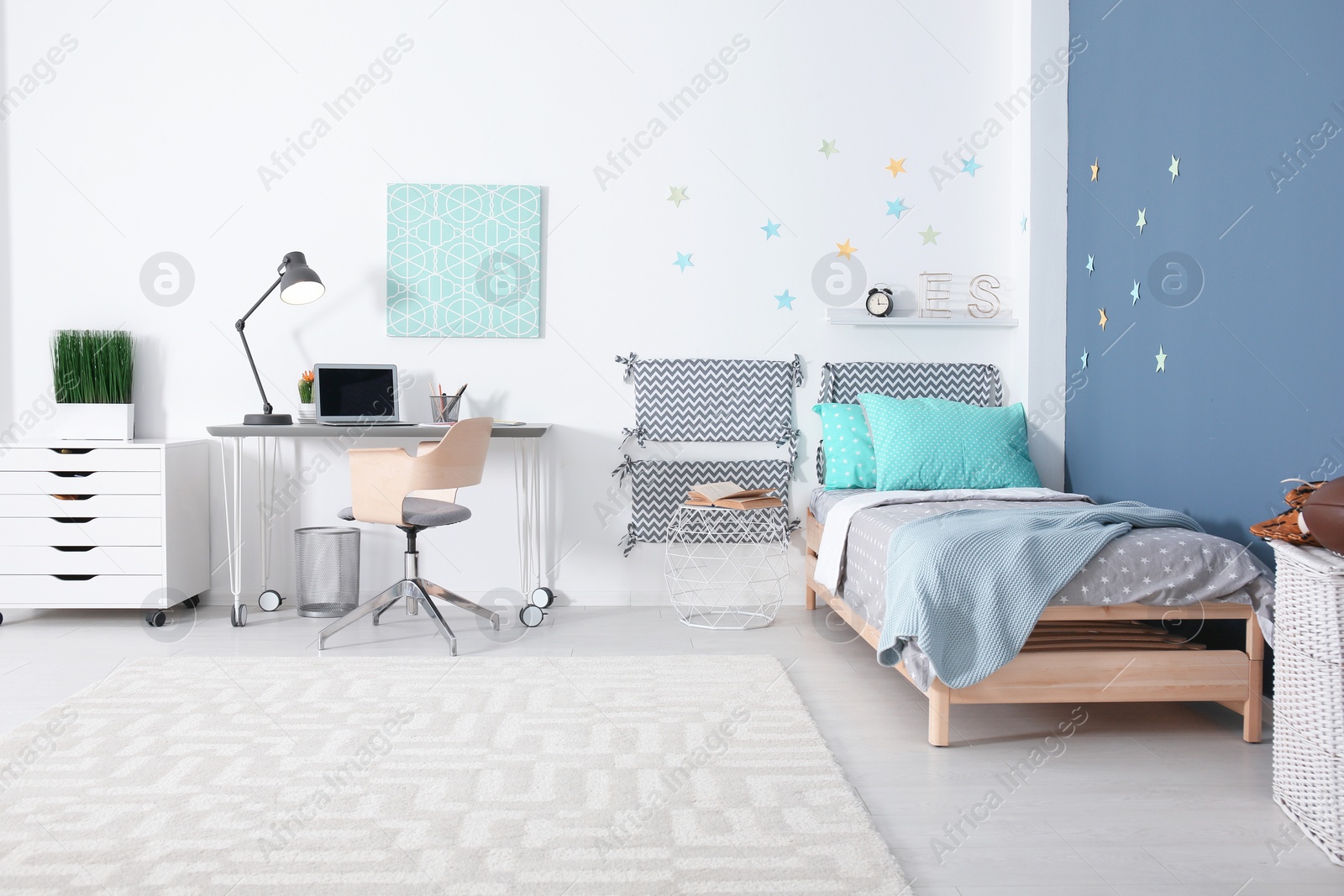 Photo of Modern child room interior with comfortable bed and desk