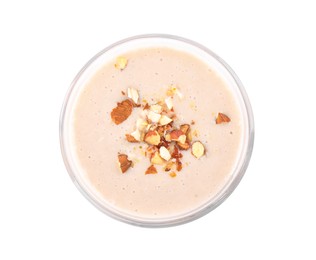 Photo of Glass of tasty banana smoothie with almond on white background, top view