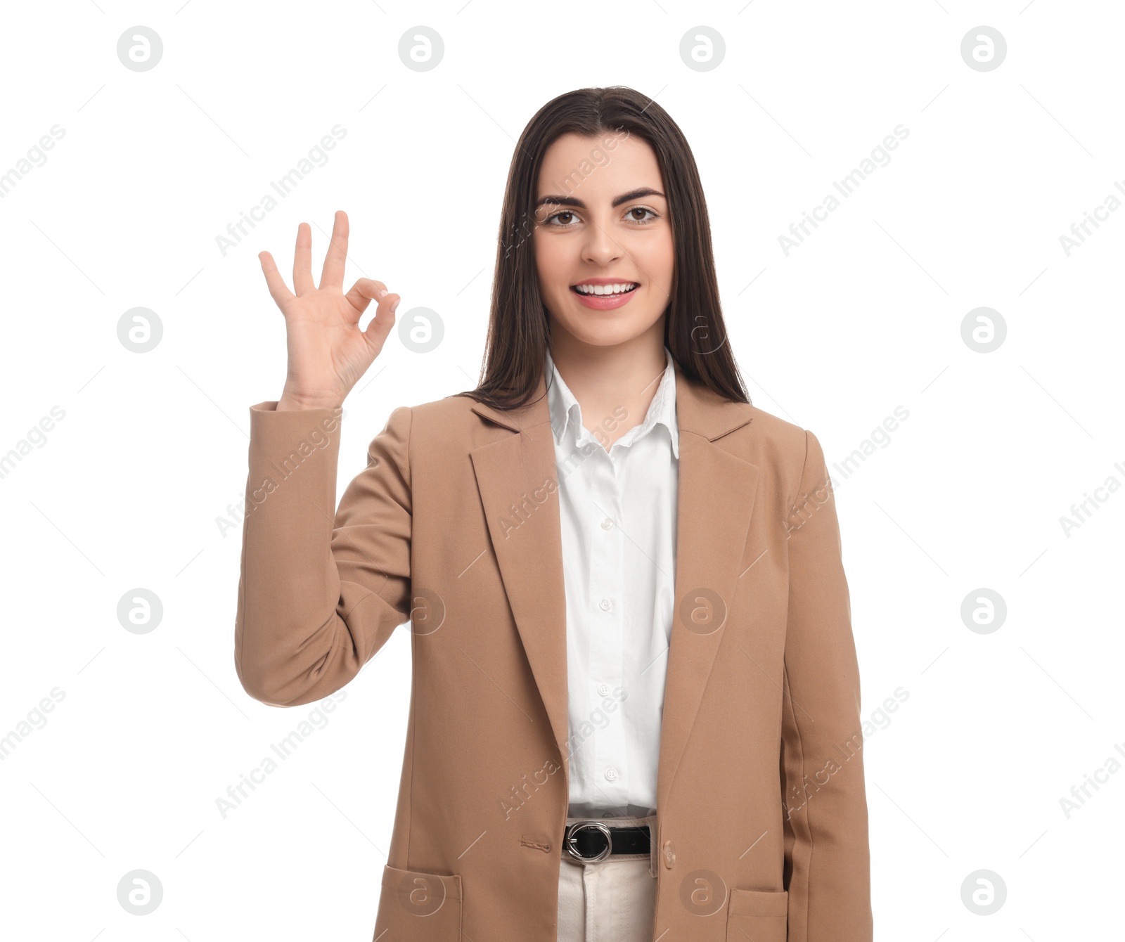 Photo of Beautiful happy businesswoman showing OK gesture on white background