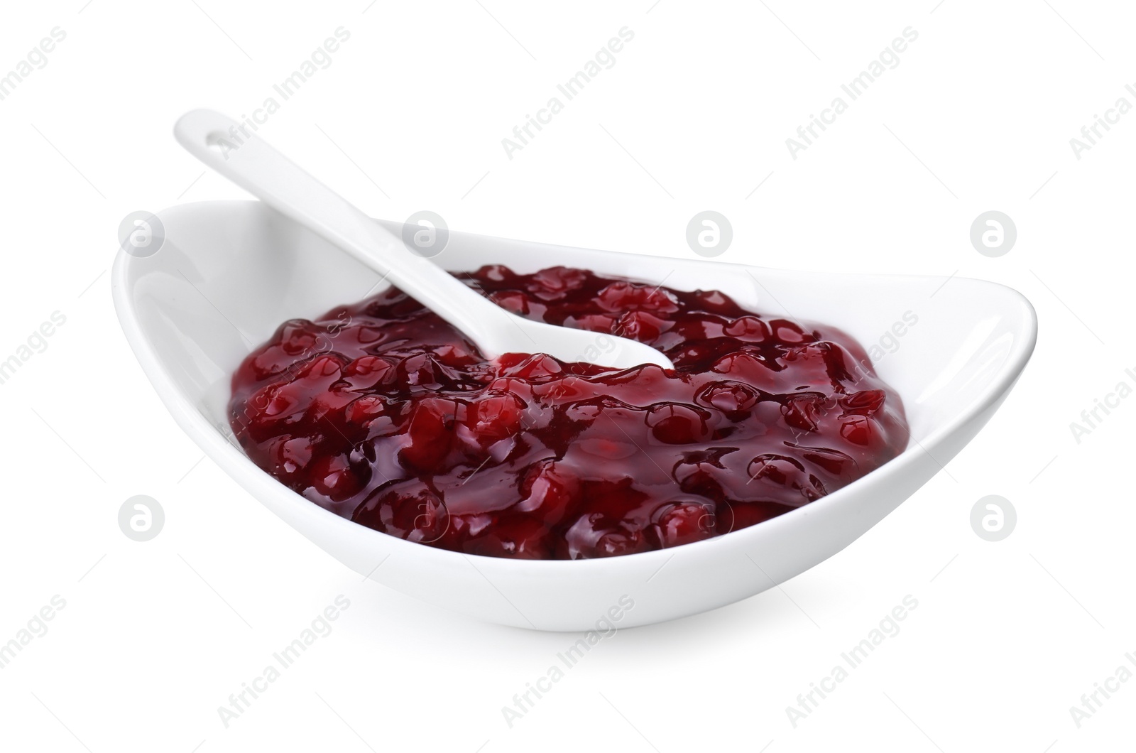 Photo of Fresh cranberry sauce in bowl isolated on white