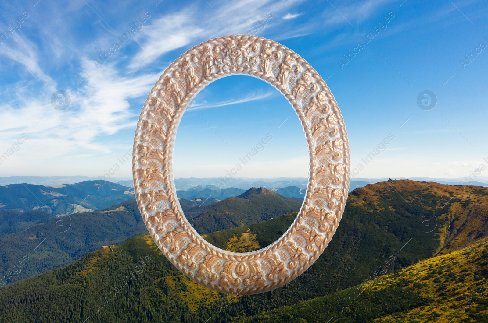 Image of Vintage frame and beautiful mountains under blue sky with clouds