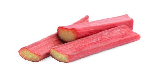 Photo of Stalks of fresh ripe rhubarb isolated on white