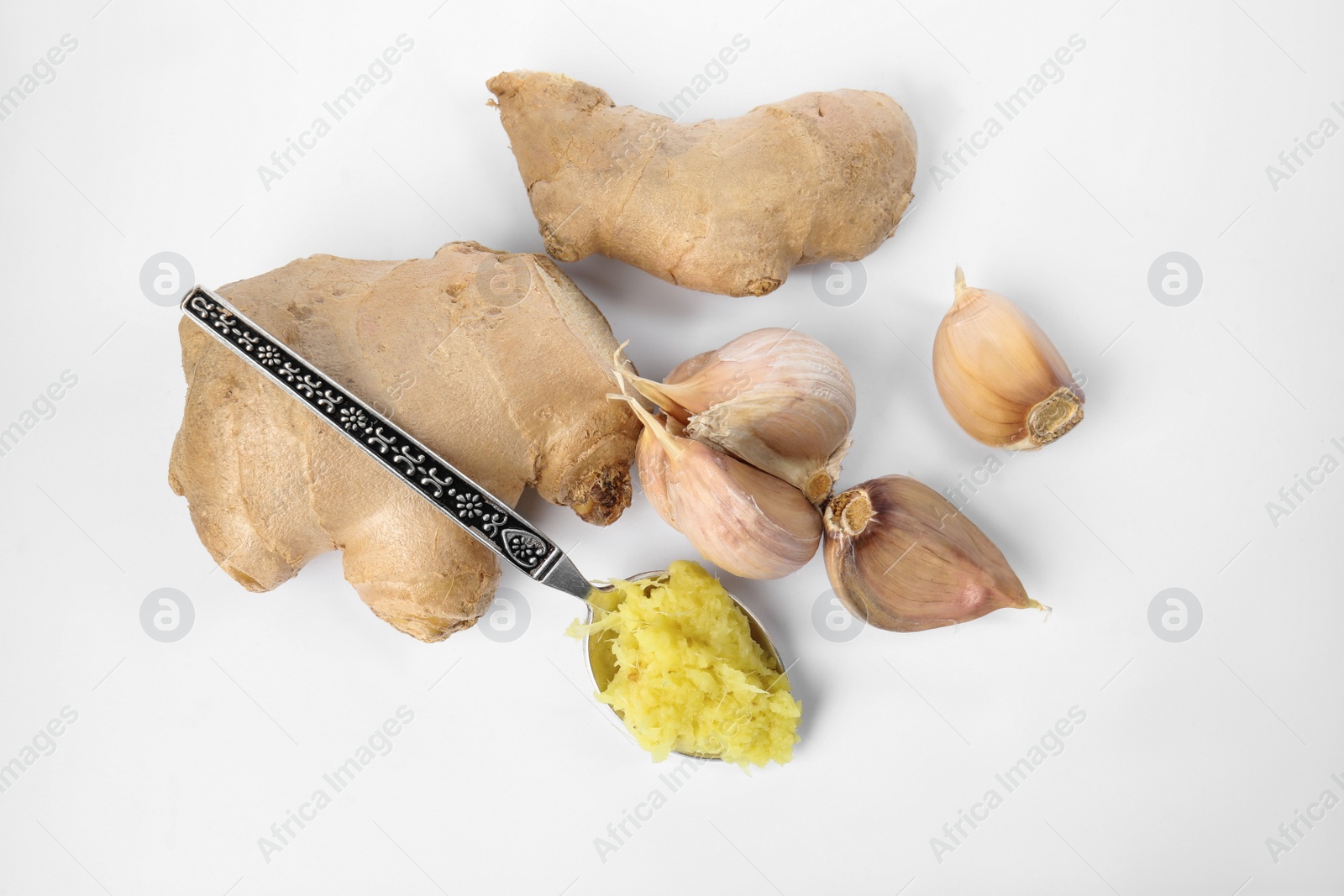 Photo of Fresh garlic and ginger isolated on white, top view. Natural cold remedies