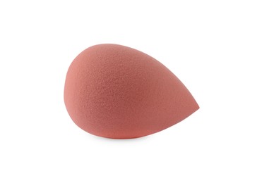 Photo of One coral makeup sponge isolated on white