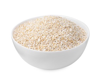 Raw barley groats in bowl isolated on white