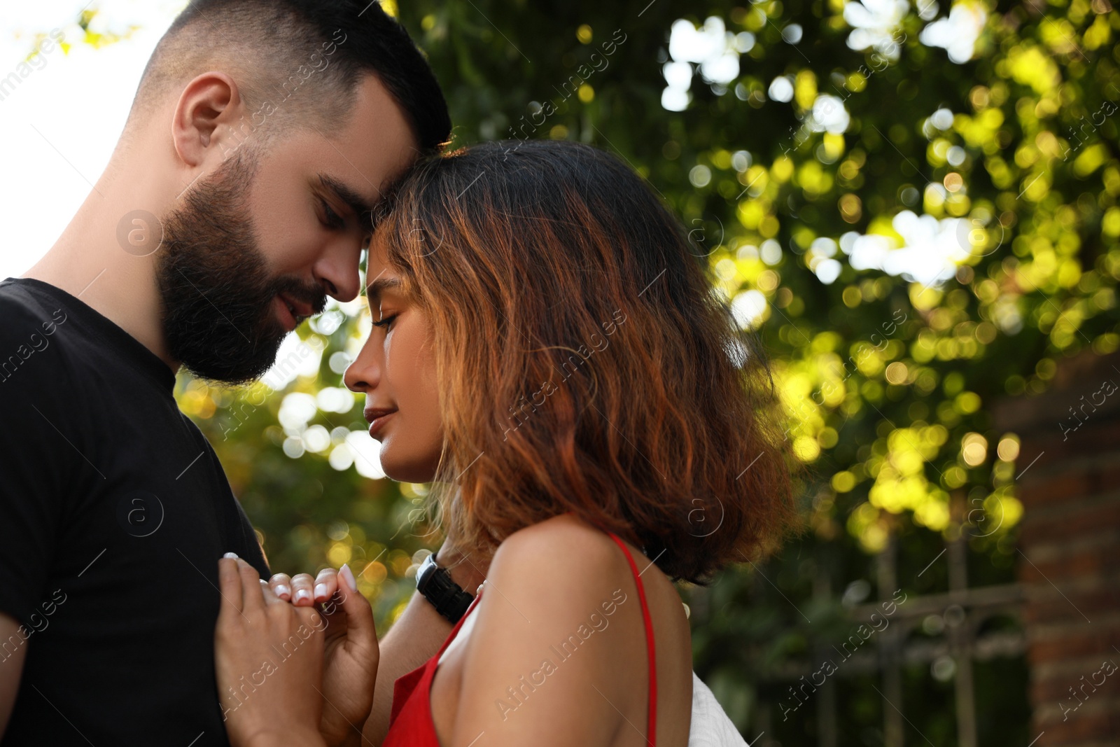 Photo of Happy young couple together on city street