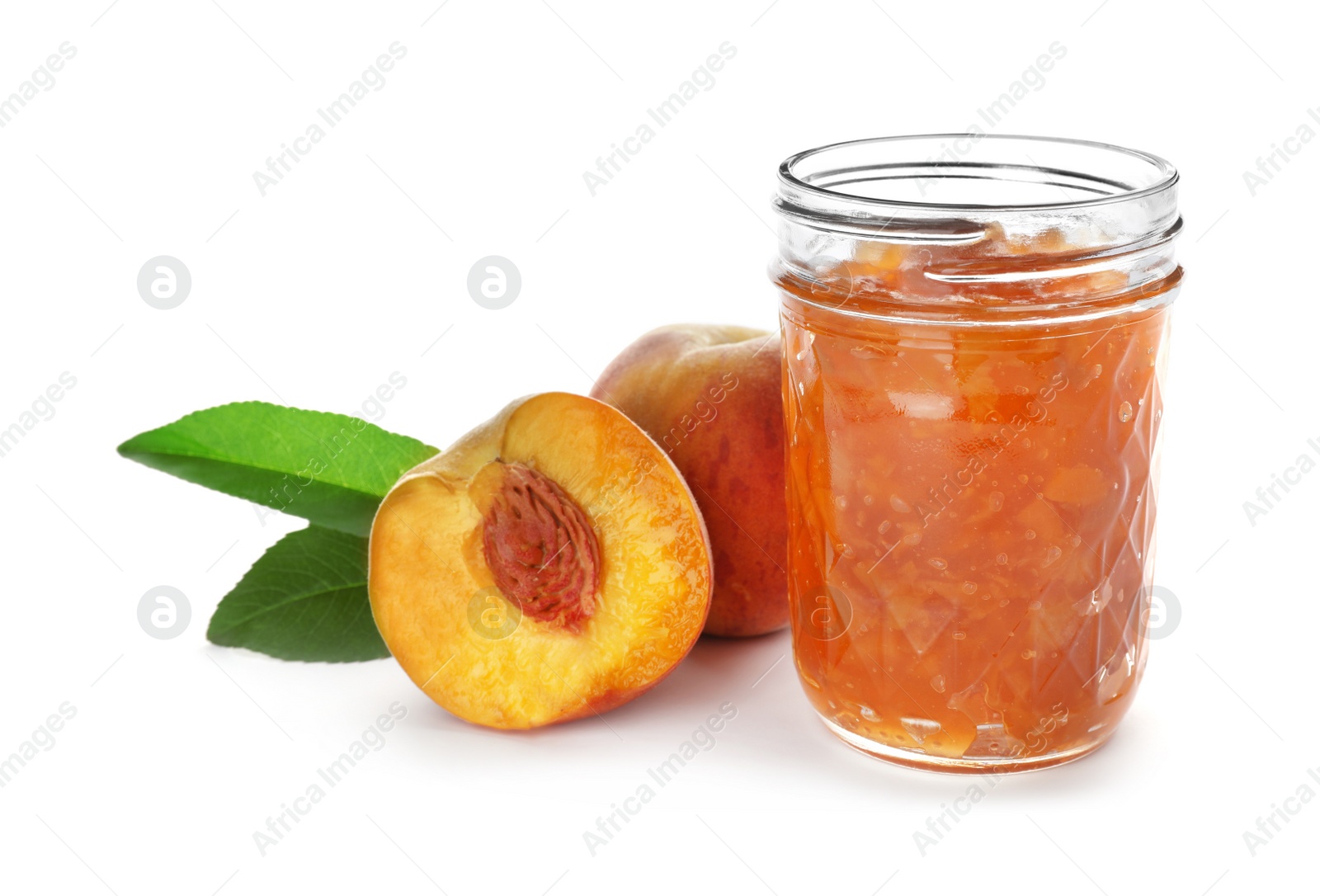 Photo of Jar with peach jam and fresh fruit on white background