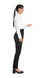 Photo of Happy businesswoman in shirt and black pants on white background