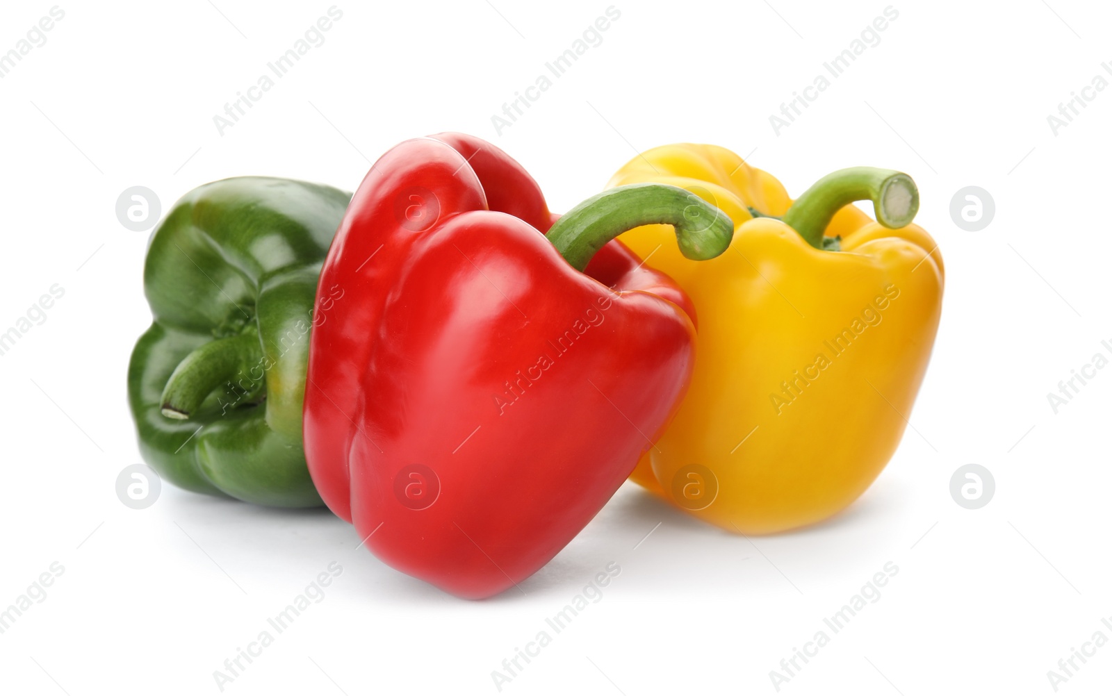 Photo of Raw ripe paprika peppers on white background