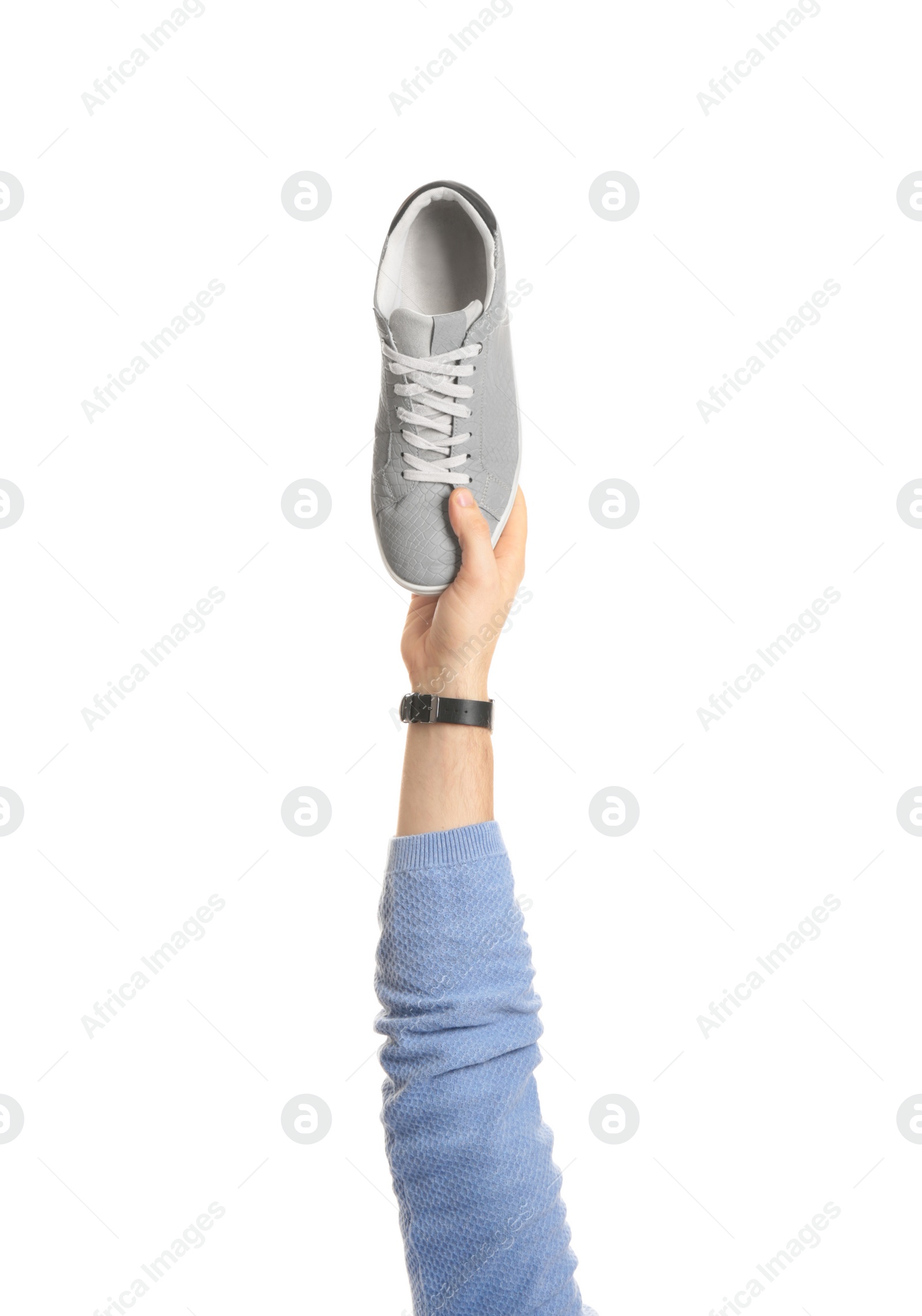 Photo of Man holding stylish shoe on white background, closeup