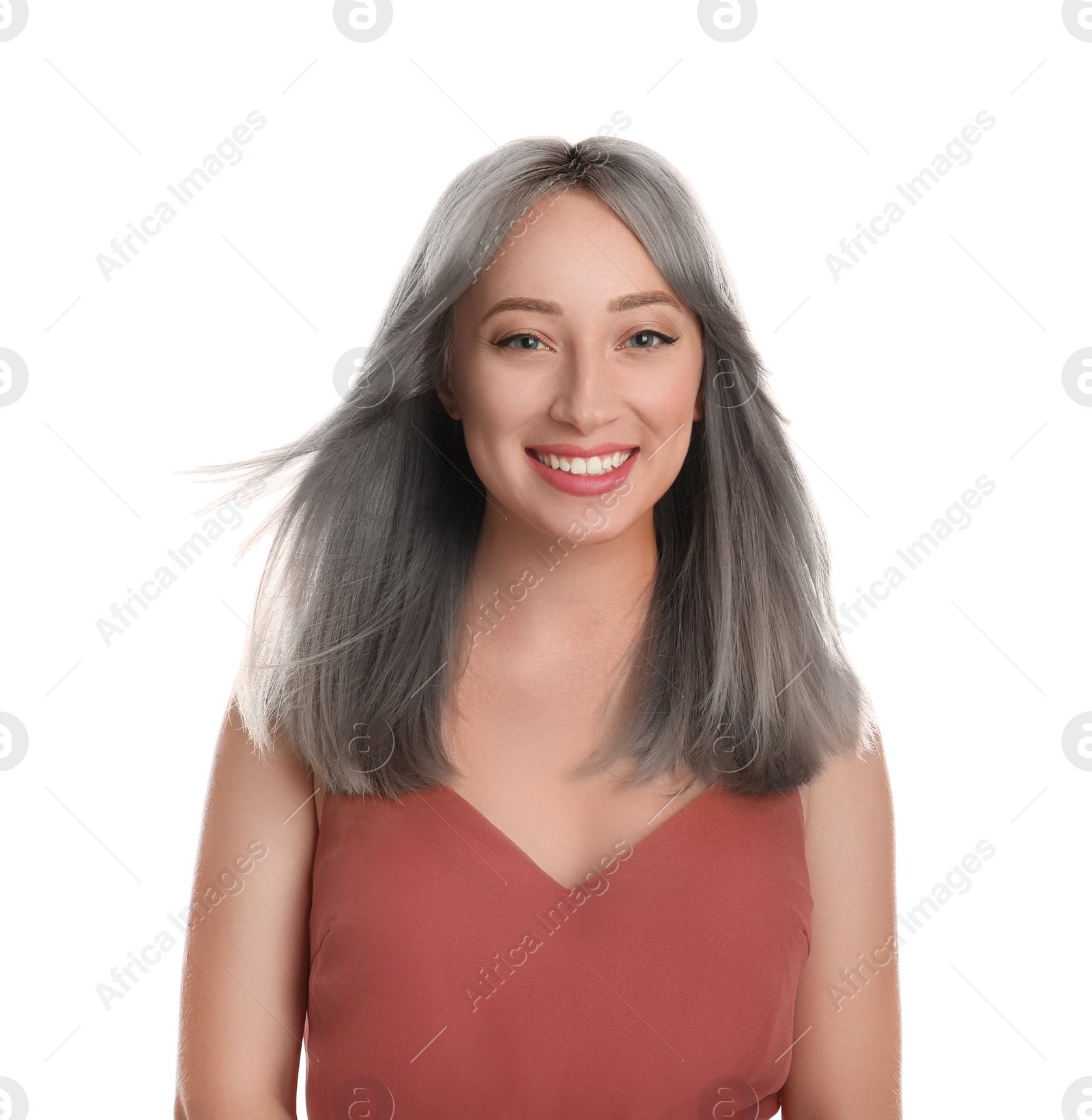 Image of Portrait of smiling woman with ash hair color on white background