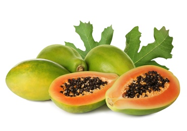 Image of Fresh ripe papaya fruits and green leaves on white background