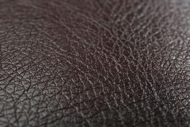 Photo of Texture of brown leather as background, closeup