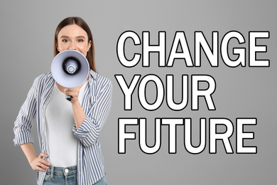 Image of Young woman with megaphone and phrase CHANGE YOUR FUTURE on grey background. Career promotion