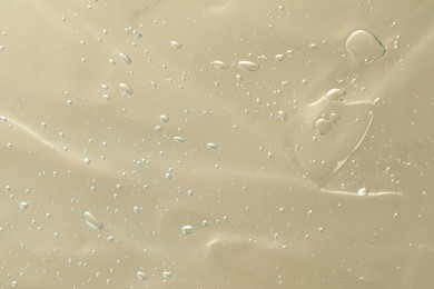 Transparent cleansing gel as background, closeup. Cosmetic product