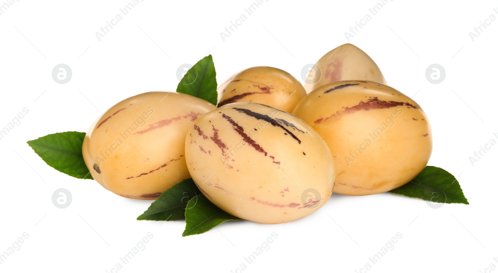 Photo of Fresh ripe pepino melons with green leaves on white background