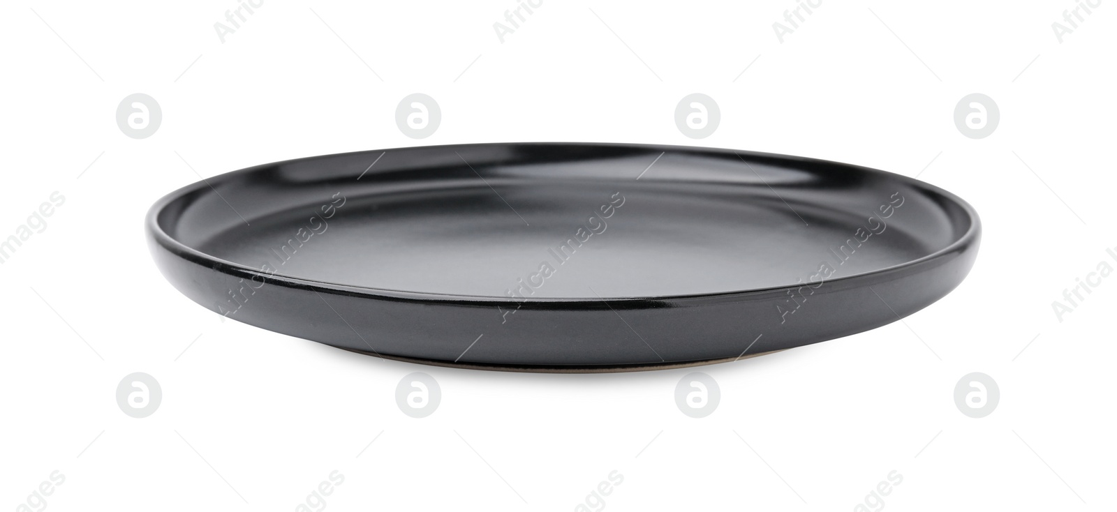 Photo of One black ceramic plate isolated on white. Cooking utensil