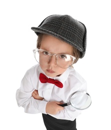 Cute little child in hat with magnifying glass playing detective on white background, above view
