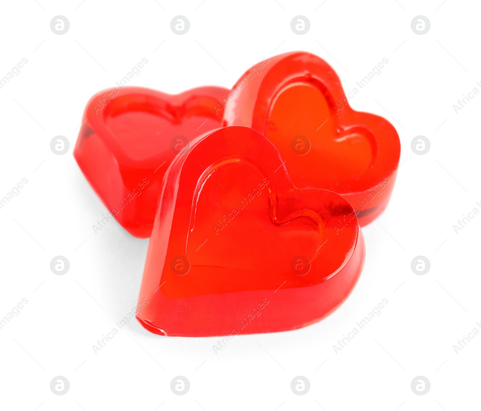 Photo of Tasty heart shaped jelly candies on white background