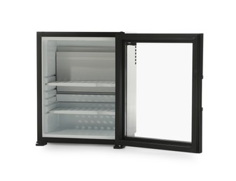 Photo of Empty mini bar with open glass door isolated on white