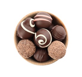 Many different delicious chocolate truffles in bowl on white background, top view