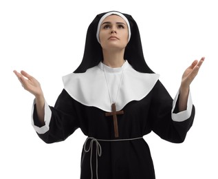 Nun praying to God on white background