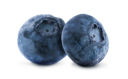 Two whole ripe blueberries on white background