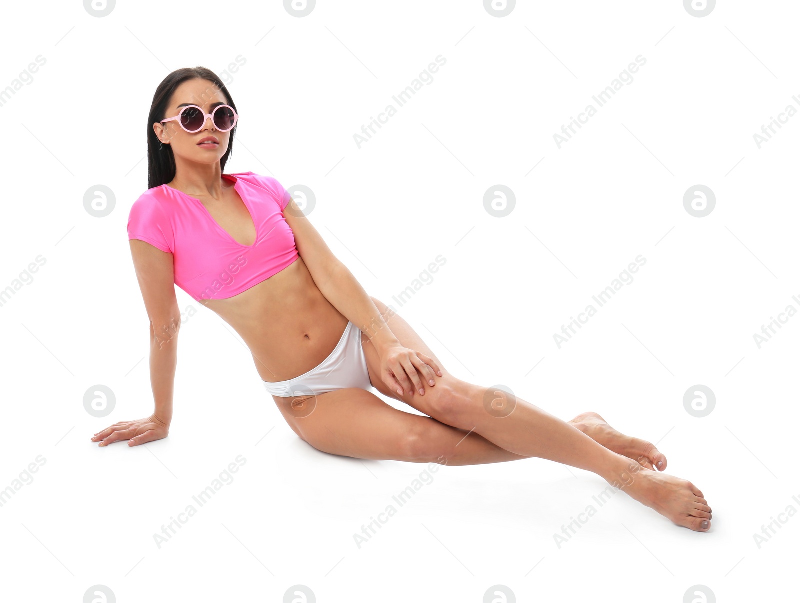 Photo of Beautiful young woman in stylish bikini with sunglasses on white background