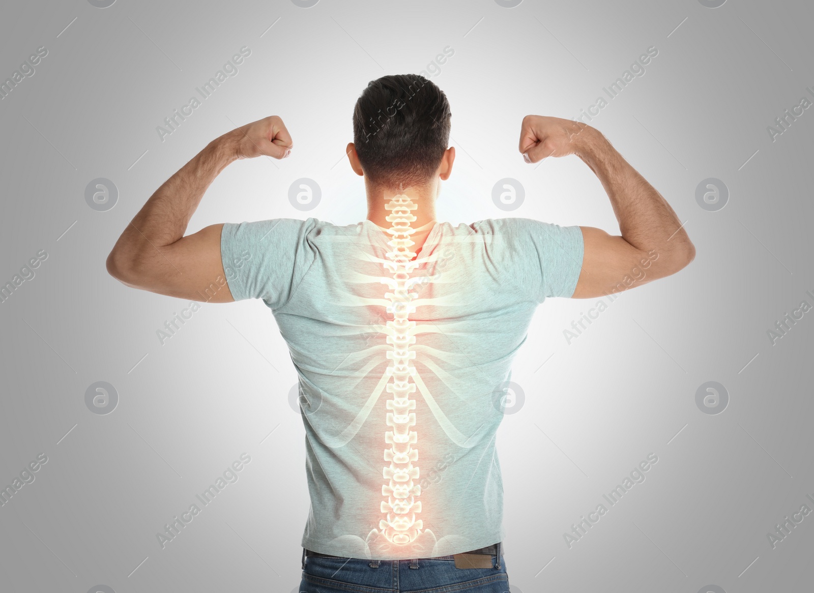 Image of Man with healthy back on light background. Spine pain prevention