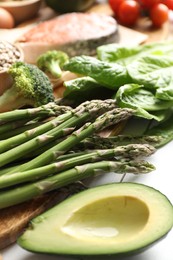 Many different healthy food on white table, closeup