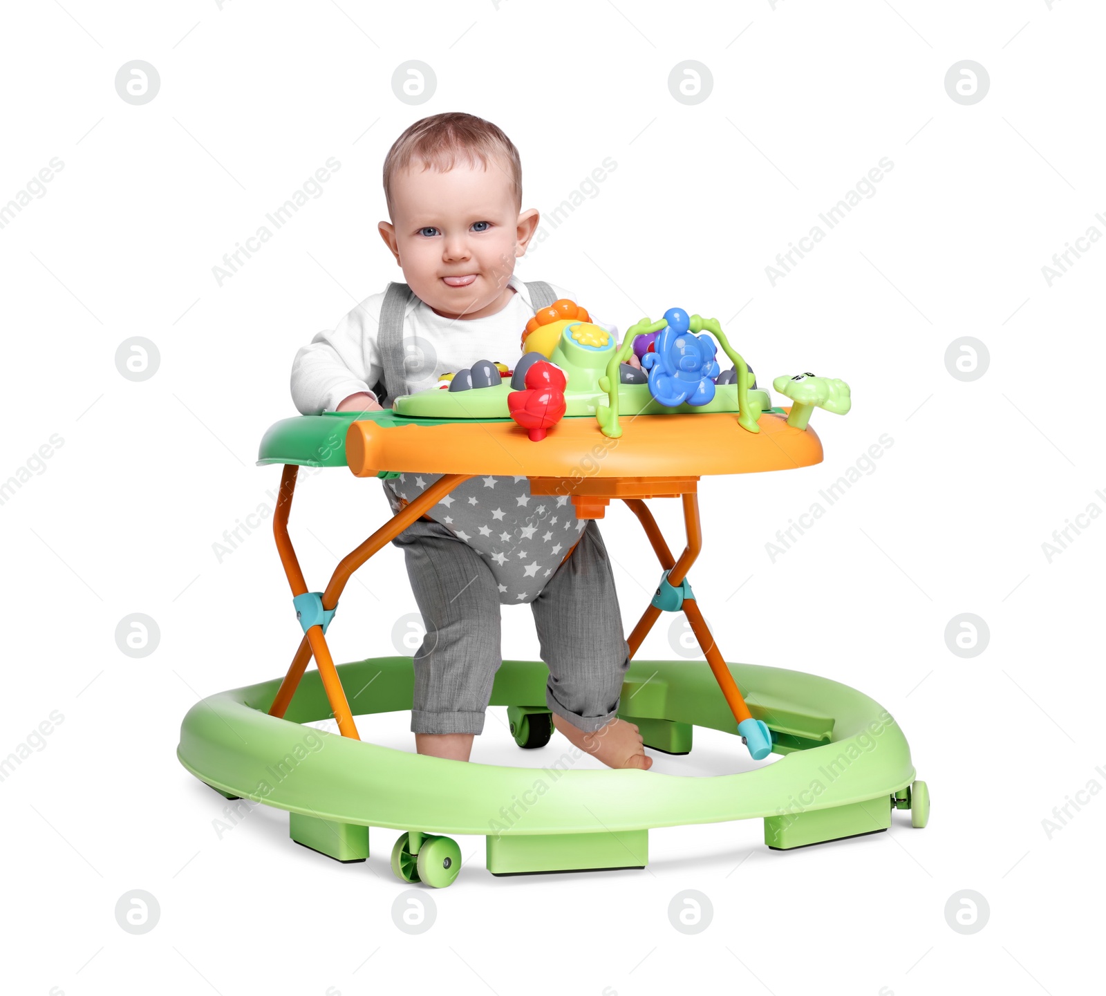 Photo of Portrait of cute little boy in baby walker on white background