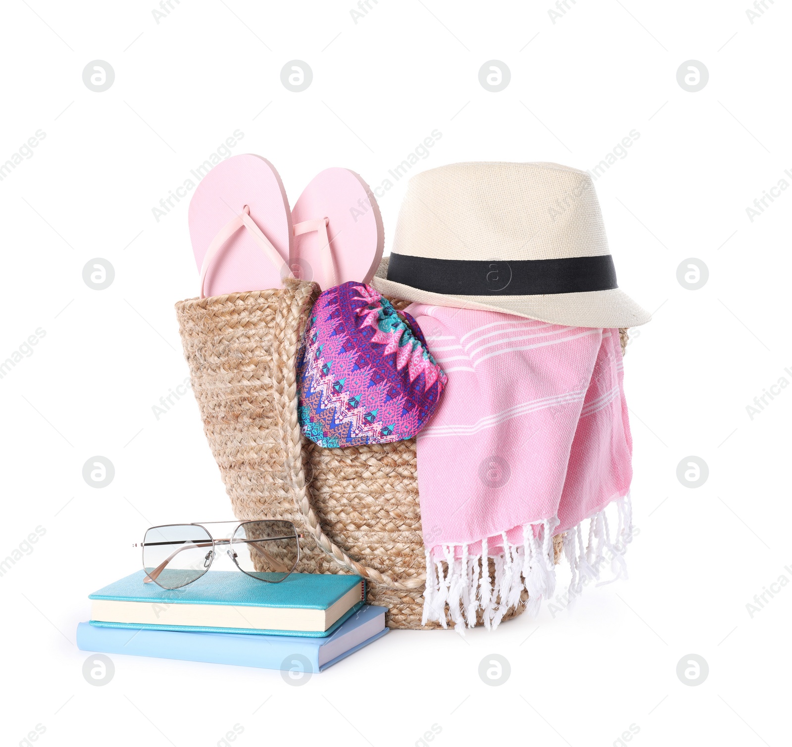 Photo of Bag and beach accessories on white background