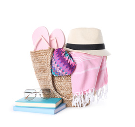 Bag and beach accessories on white background
