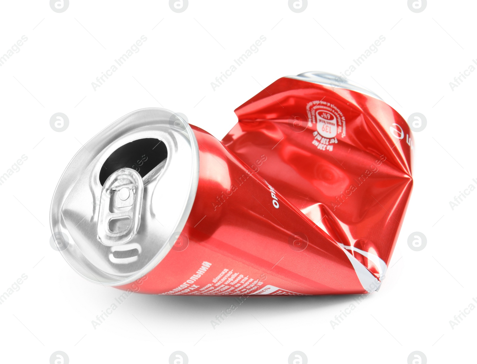 Photo of MYKOLAIV, UKRAINE - NOVEMBER 15, 2018: Crumpled Coca Cola can on white background