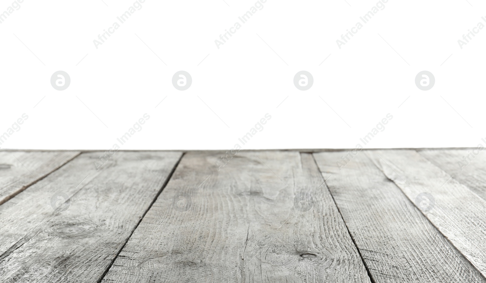 Photo of Empty wooden table surface on white background