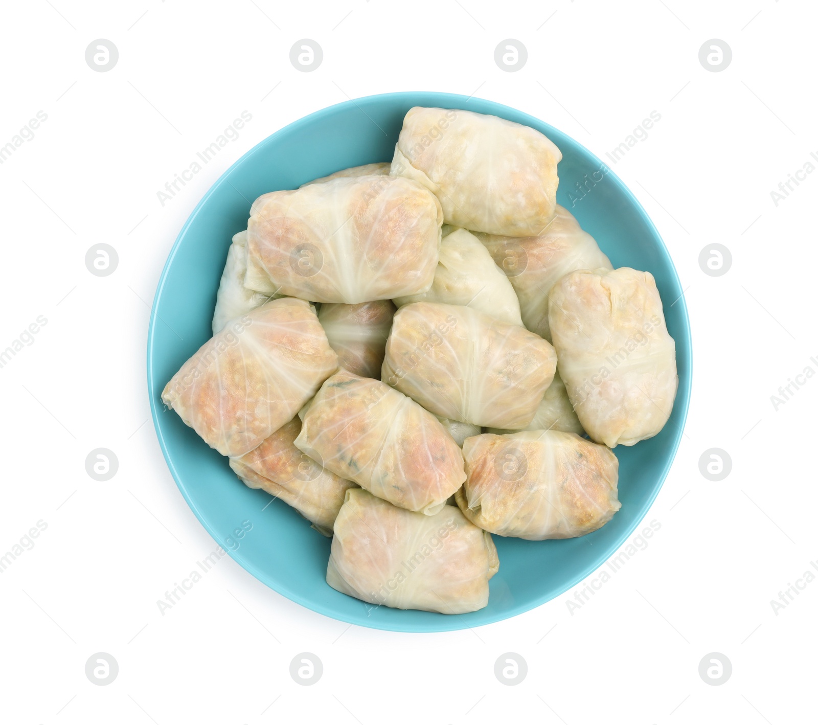 Photo of Uncooked stuffed cabbage rolls on white background, top view