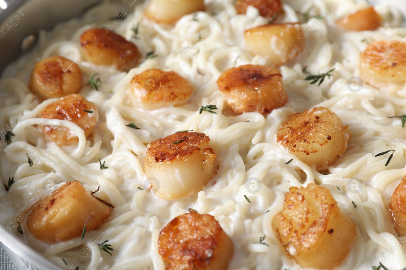 Photo of Delicious scallop pasta as background, closeup view