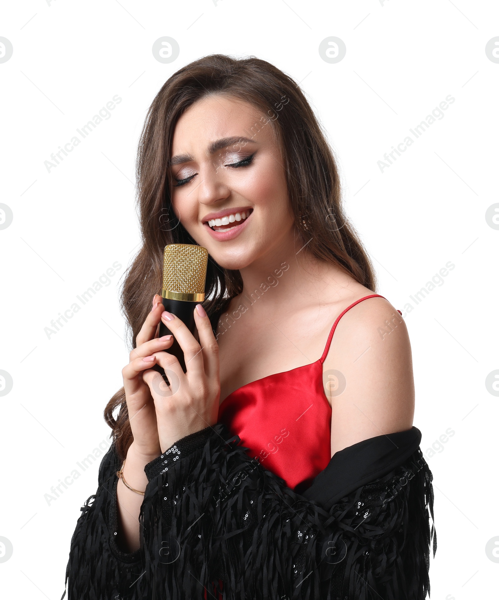 Photo of Beautiful young woman with microphone singing on white background