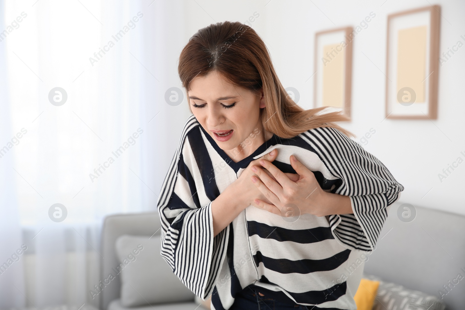 Photo of Woman having heart attack at home