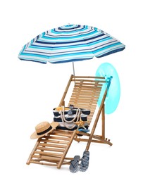 Deck chair, umbrella and other beach accessories isolated on white