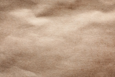 Photo of Brown paper bag texture as background, top view