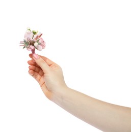 Woman holding stylish boutonniere on white background, closeup