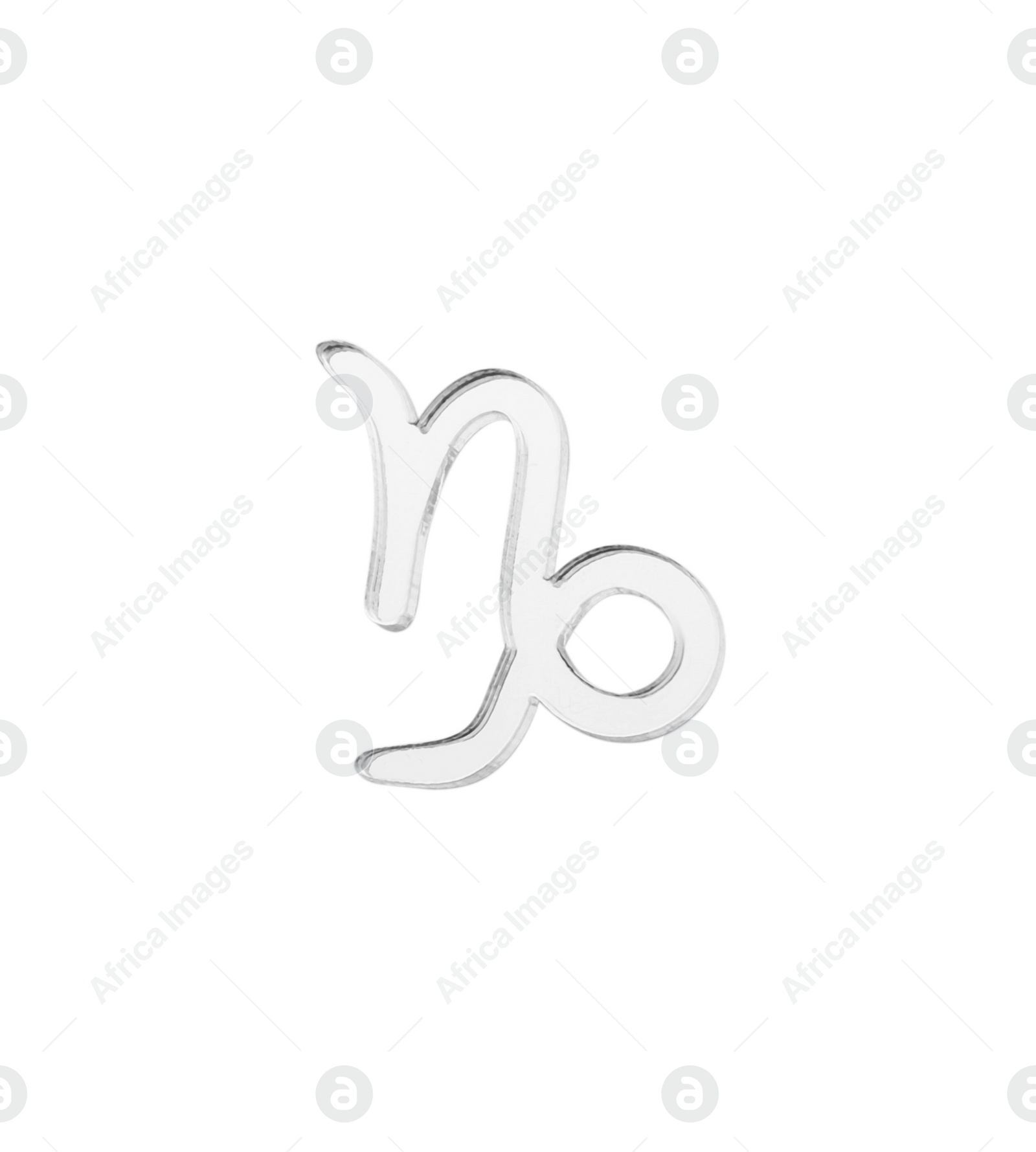 Photo of Zodiac sign. Silver Capricorn symbol isolated on white, top view