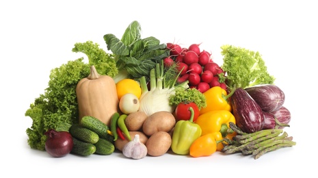 Different fresh ripe vegetables on white background