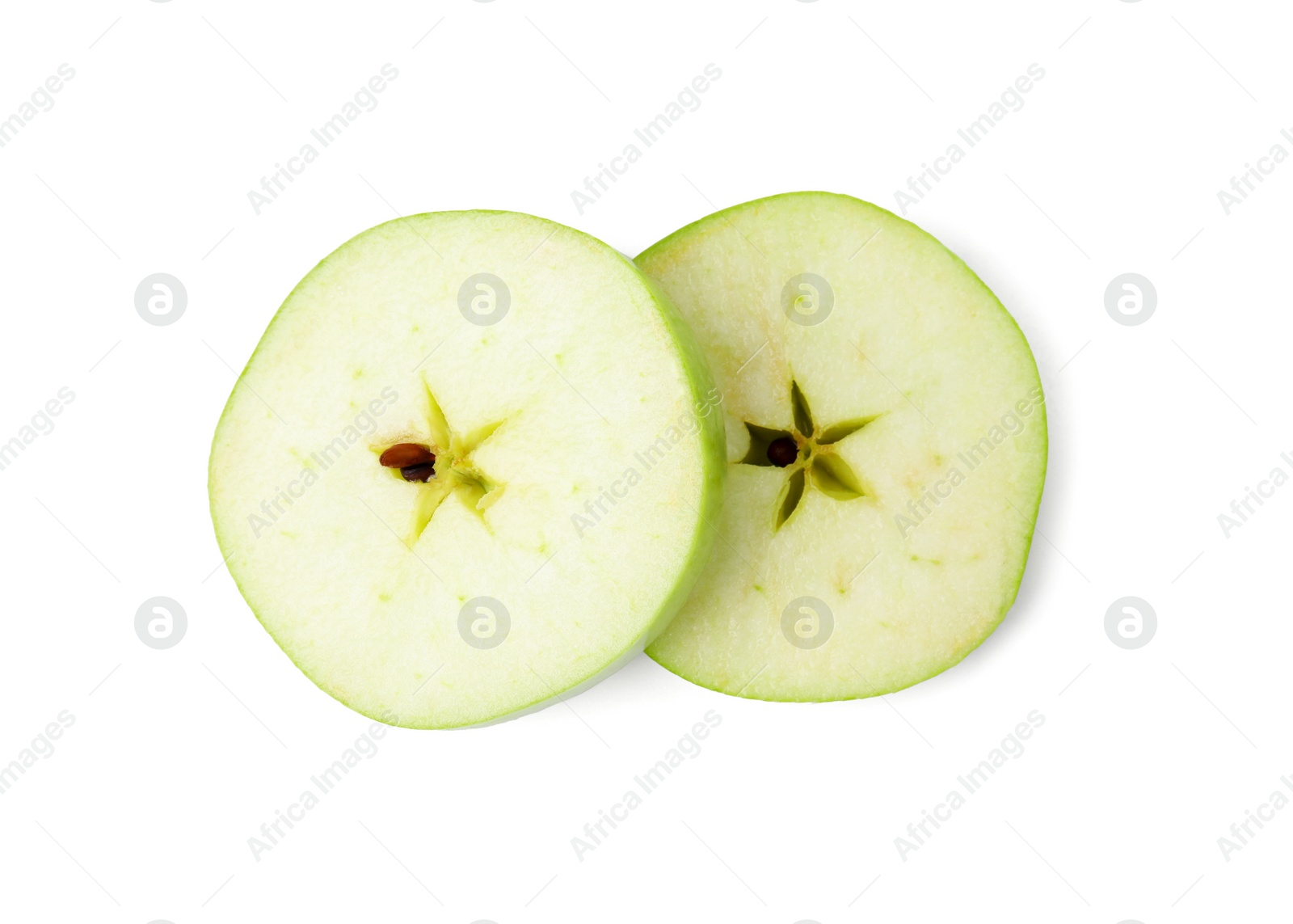 Photo of Slices of ripe green apple isolated on white, top view