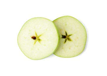 Photo of Slices of ripe green apple isolated on white, top view